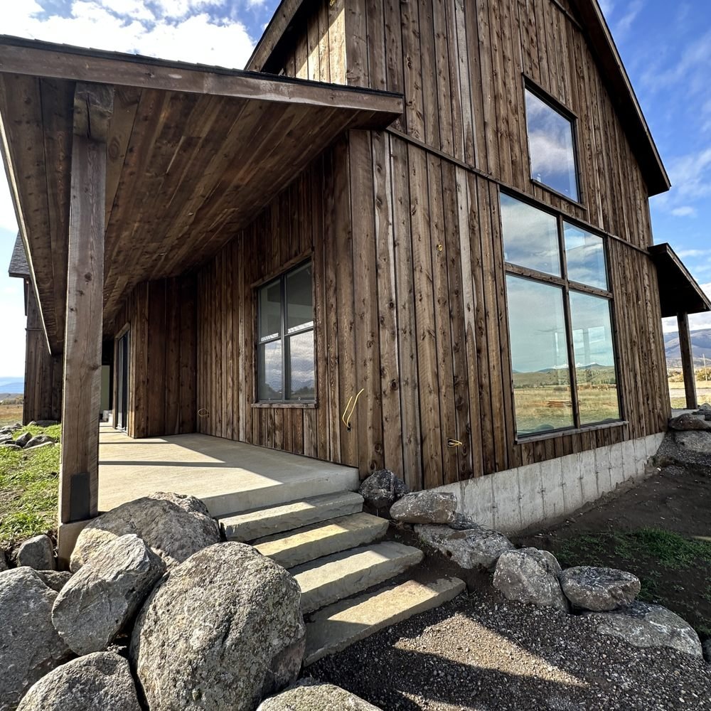 Home Building and Remodeling in Livingston - MT underway as a contractor reviews framing inside a residential addition
