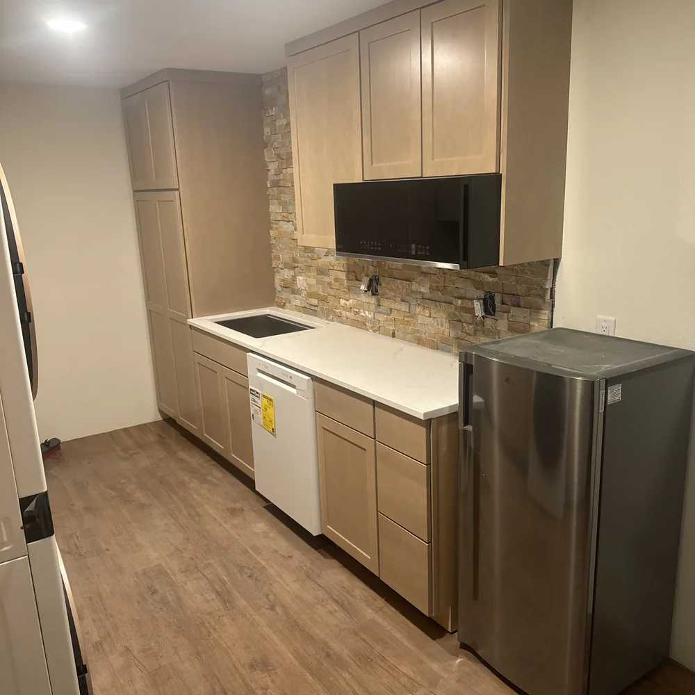 Residential Remodeling in Bozeman - MT underway as a crew updates a bright family kitchen